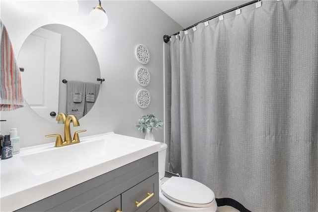 1208 Brandl Dr SW, Marietta, GA 30008 - bathroom with vanity, toilet, and a shower with shower curtain