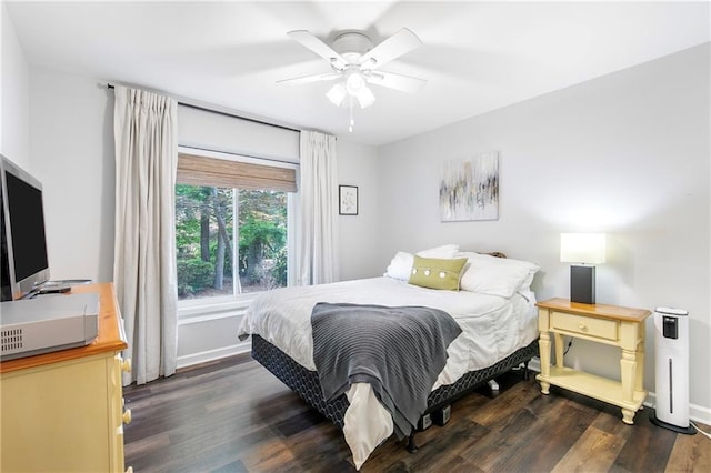 1208 Brandl Dr SW, Marietta, GA 30008 - bedroom with wood finished floors, a ceiling fan, and baseboards