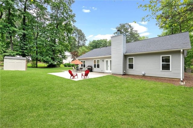 1208 Brandl Dr SW, Marietta, GA 30008 - rear view of property with a patio, a yard, a chimney, french doors, and a shingled roof