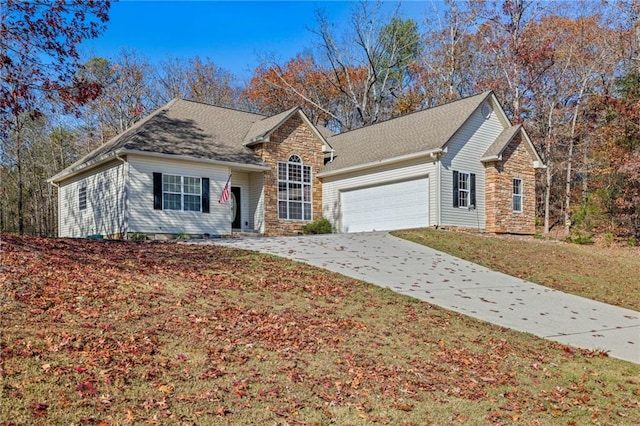 view of front facade featuring a front lawn and a garage