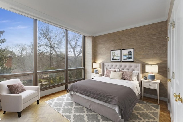 bedroom with light parquet flooring