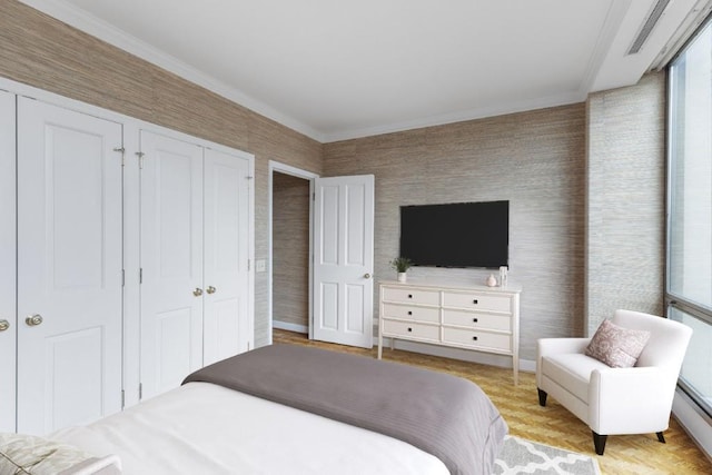 bedroom featuring crown molding and light parquet floors