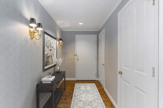 doorway to outside with dark parquet flooring and ornamental molding