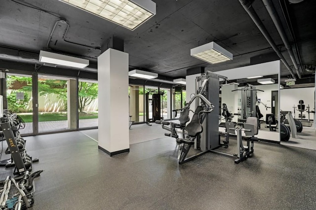 workout area featuring plenty of natural light