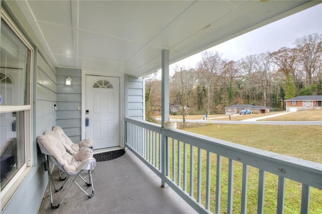 balcony featuring a porch