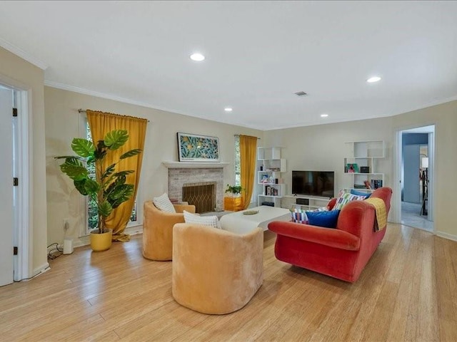 212 Abingdon Way, Atlanta, GA 30328 - living area featuring a brick fireplace, light wood-style flooring, recessed lighting, ornamental molding, and baseboards