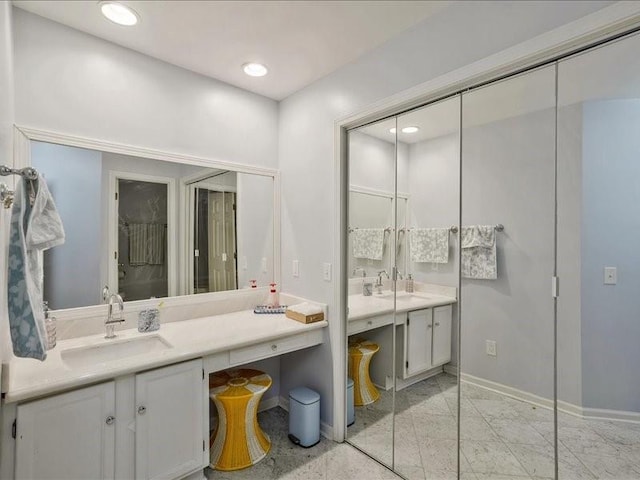212 Abingdon Way, Atlanta, GA 30328 - full bath with baseboards, vanity, and recessed lighting
