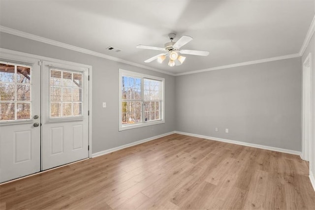 entryway featuring ornamental molding, ceiling fan, and light wood-type flooring