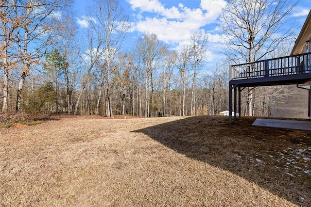 view of yard with a deck