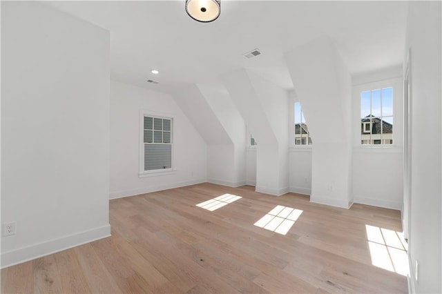 additional living space with light wood-type flooring