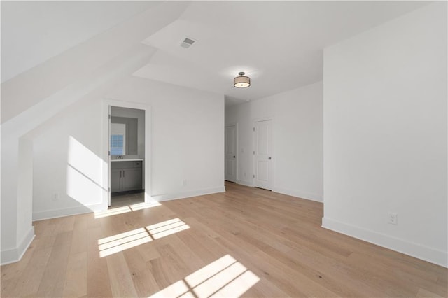 empty room featuring light hardwood / wood-style floors