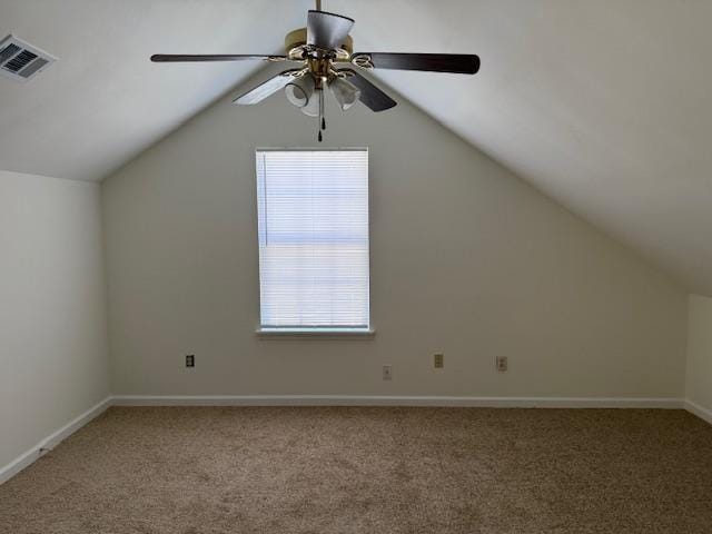 bonus room featuring carpet, visible vents, and lofted ceiling