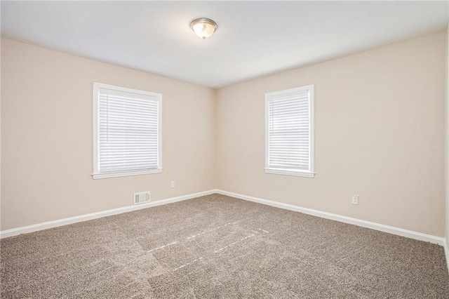 view of carpeted spare room