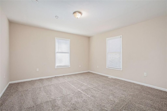 view of carpeted spare room