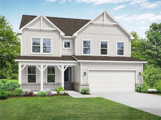 view of front of house with a front yard and a garage