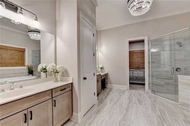 bathroom featuring vanity, separate shower and tub, crown molding, and an inviting chandelier