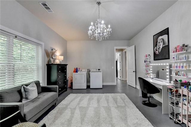 office area with an inviting chandelier and independent washer and dryer