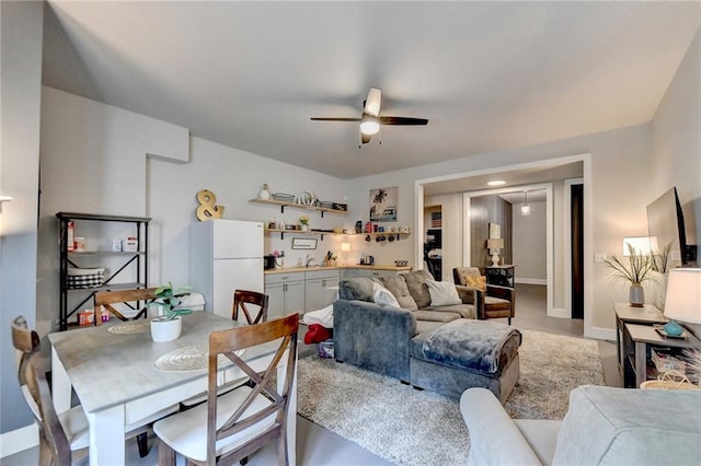 living room featuring ceiling fan