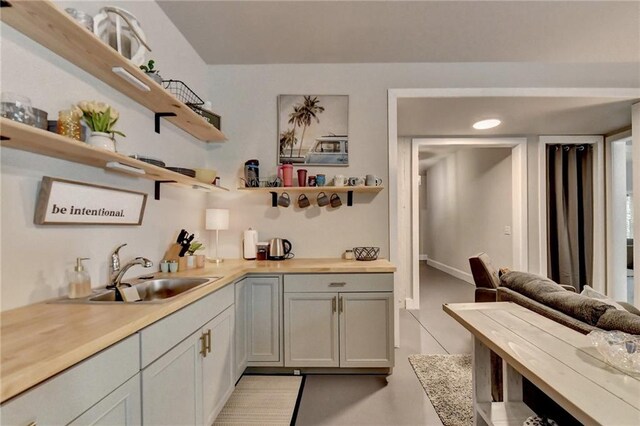 kitchen featuring sink and butcher block countertops