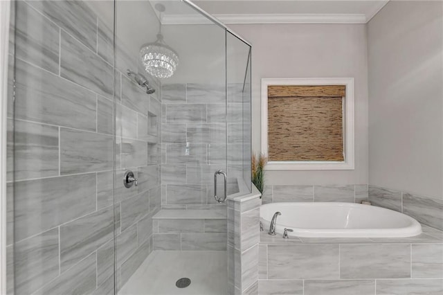 bathroom featuring ornamental molding, plus walk in shower, and an inviting chandelier