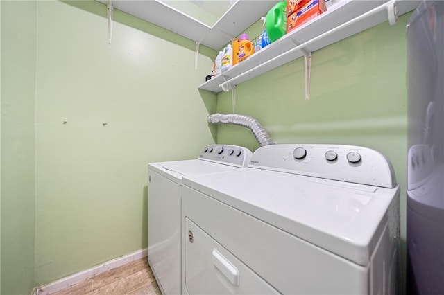 laundry room with separate washer and dryer