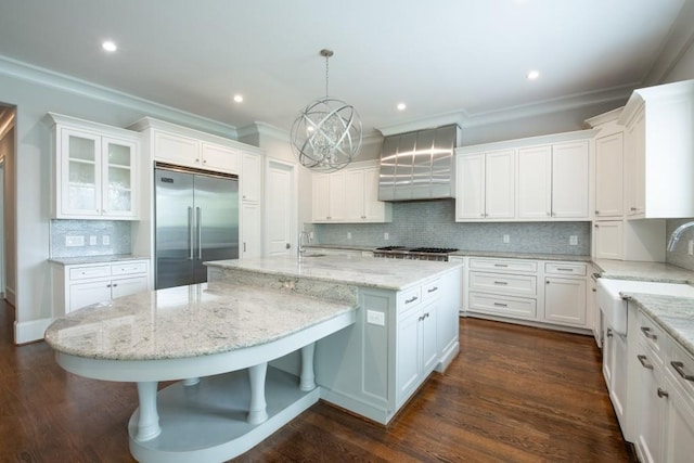 22 Mount Paran Rd, Atlanta, GA 30327 - kitchen with stainless steel appliances, a sink, crown molding, backsplash, and white cabinetry
