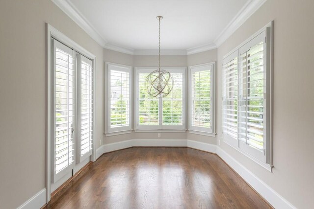 22 Mount Paran Rd, Atlanta, GA 30327 - unfurnished dining area with a chandelier, healthy amount of natural light, dark wood-type flooring, baseboards, and ornamental molding