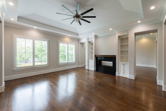 22 Mount Paran Rd, Atlanta, GA 30327 - unfurnished living room with a tray ceiling, recessed lighting, ceiling fan, built in shelves, and baseboards