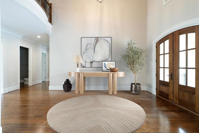 22 Mount Paran Rd, Atlanta, GA 30327 - entrance foyer featuring french doors, a towering ceiling, wood finished floors, baseboards, and crown molding