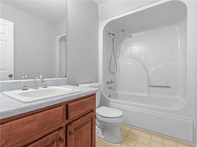 full bathroom featuring shower / tub combination, vanity, and toilet