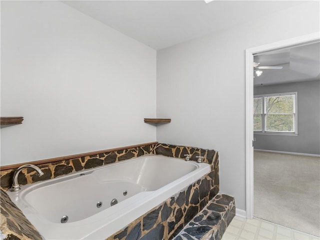 bathroom with a relaxing tiled tub