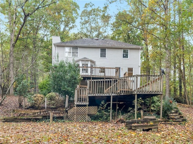 rear view of house with a deck