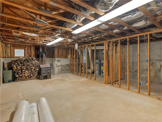 basement featuring a wood stove