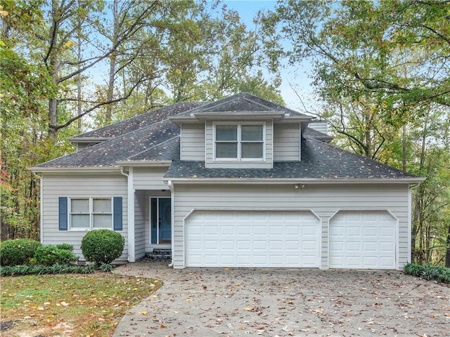 front facade with a garage