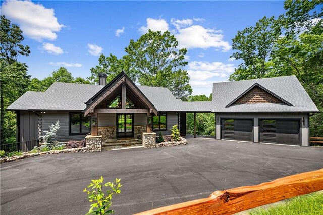 453 Settlers Ridge Rd, Ellijay, GA 30540 - view of front of home with roof with shingles, french doors, driveway, and a garage