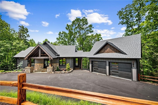 453 Settlers Ridge Rd, Ellijay, GA 30540 - view of front facade featuring a shingled roof, asphalt driveway, and a garage