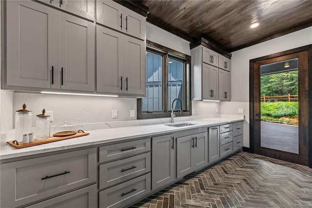 453 Settlers Ridge Rd, Ellijay, GA 30540 - kitchen with gray cabinets, wooden ceiling, light stone countertops, and brick patterned floors