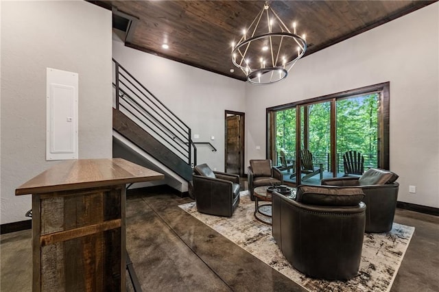 453 Settlers Ridge Rd, Ellijay, GA 30540 - living room featuring finished concrete flooring, wood ceiling, electric panel, stairs, and a chandelier
