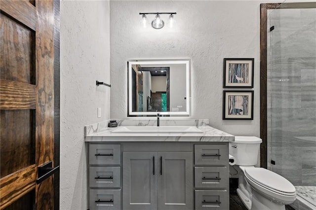 453 Settlers Ridge Rd, Ellijay, GA 30540 - bathroom with a textured wall, vanity, and a stall shower
