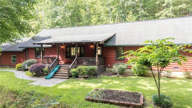 709 Deerfield Ln NW, Sugar Valley, GA 30746 - cabin with a front yard, log exterior, and covered porch