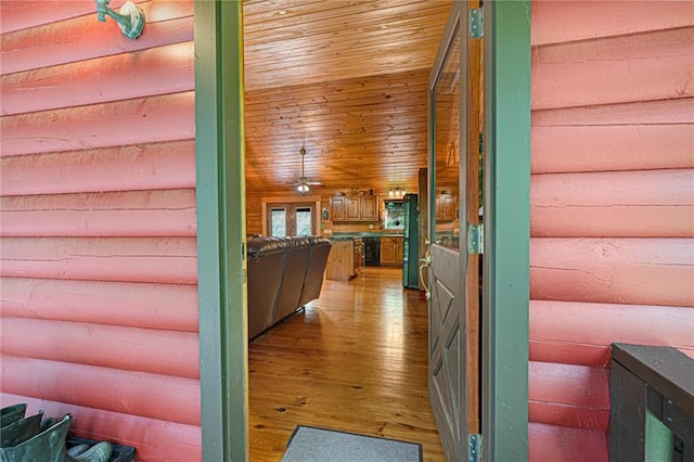 709 Deerfield Ln NW, Sugar Valley, GA 30746 - hall with light wood-style flooring, wood walls, and wooden ceiling