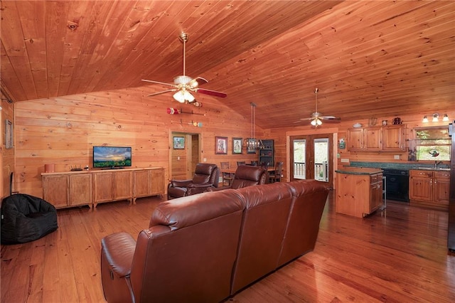 709 Deerfield Ln NW, Sugar Valley, GA 30746 - living room with a ceiling fan, vaulted ceiling, wood-type flooring, wood ceiling, and wooden walls