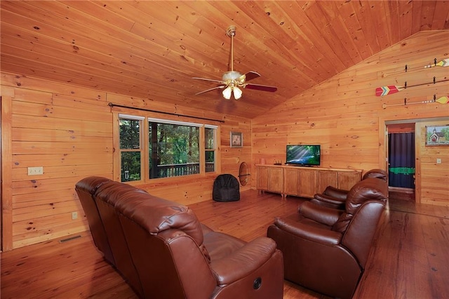 709 Deerfield Ln NW, Sugar Valley, GA 30746 - living room with lofted ceiling, wooden walls, wooden ceiling, wood-type flooring, and ceiling fan