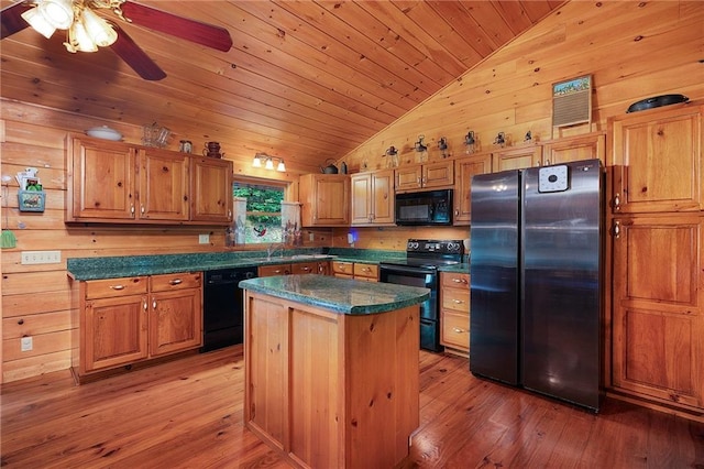 709 Deerfield Ln NW, Sugar Valley, GA 30746 - kitchen with black appliances, wooden walls, a ceiling fan, light wood-style flooring, and dark countertops