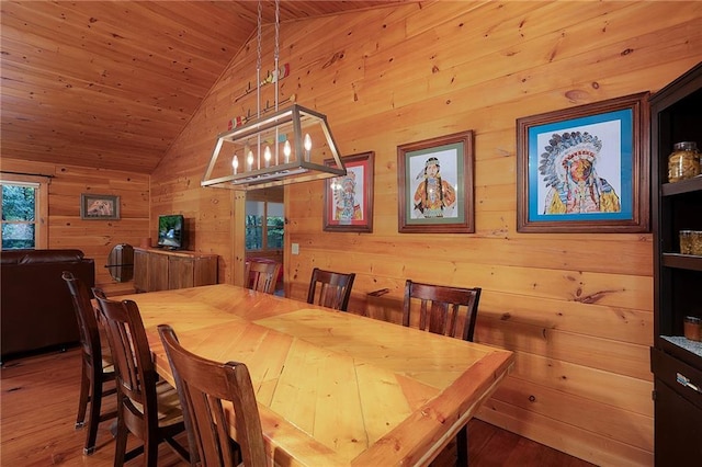 709 Deerfield Ln NW, Sugar Valley, GA 30746 - dining area featuring wooden walls, vaulted ceiling, wood ceiling, and wood finished floors