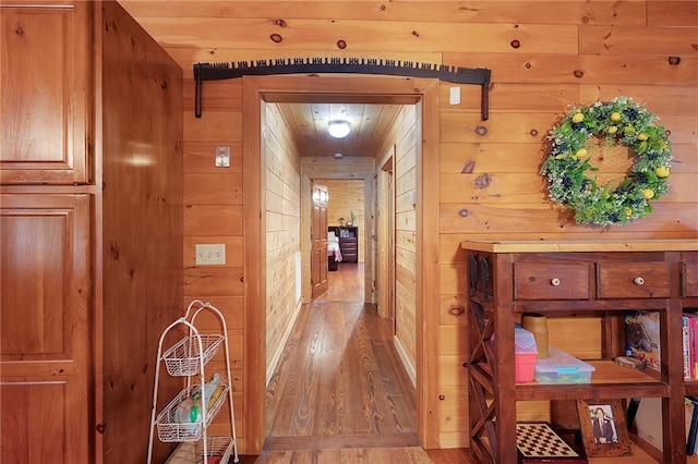 709 Deerfield Ln NW, Sugar Valley, GA 30746 - corridor featuring wooden walls and light wood finished floors