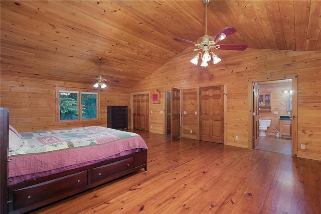 709 Deerfield Ln NW, Sugar Valley, GA 30746 - bedroom featuring vaulted ceiling, hardwood / wood-style floors, wooden walls, wooden ceiling, and connected bathroom