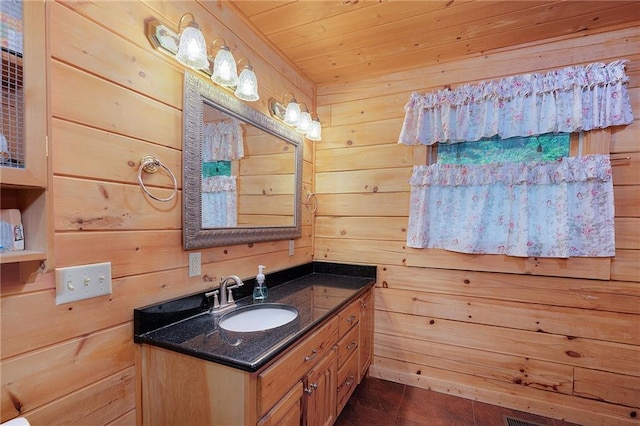 709 Deerfield Ln NW, Sugar Valley, GA 30746 - bathroom with wooden walls, vanity, wooden ceiling, and tile patterned flooring
