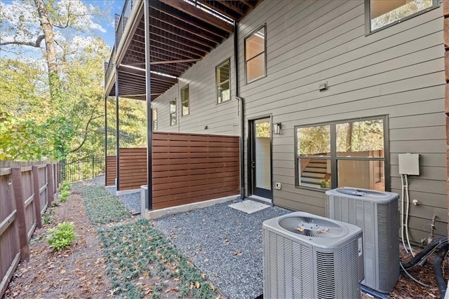 view of home's exterior with central AC unit