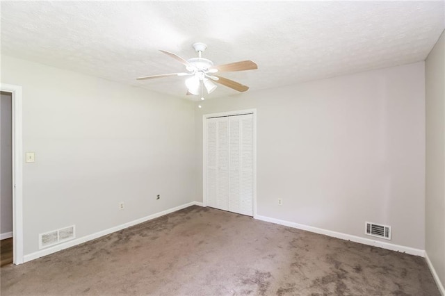 263 Austin Rd, Stockbridge, GA 30281 - unfurnished bedroom featuring carpet flooring, baseboards, and visible vents